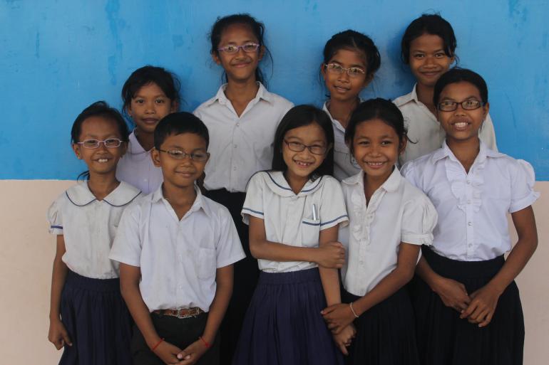 group of Cambodian school children wearing glasses