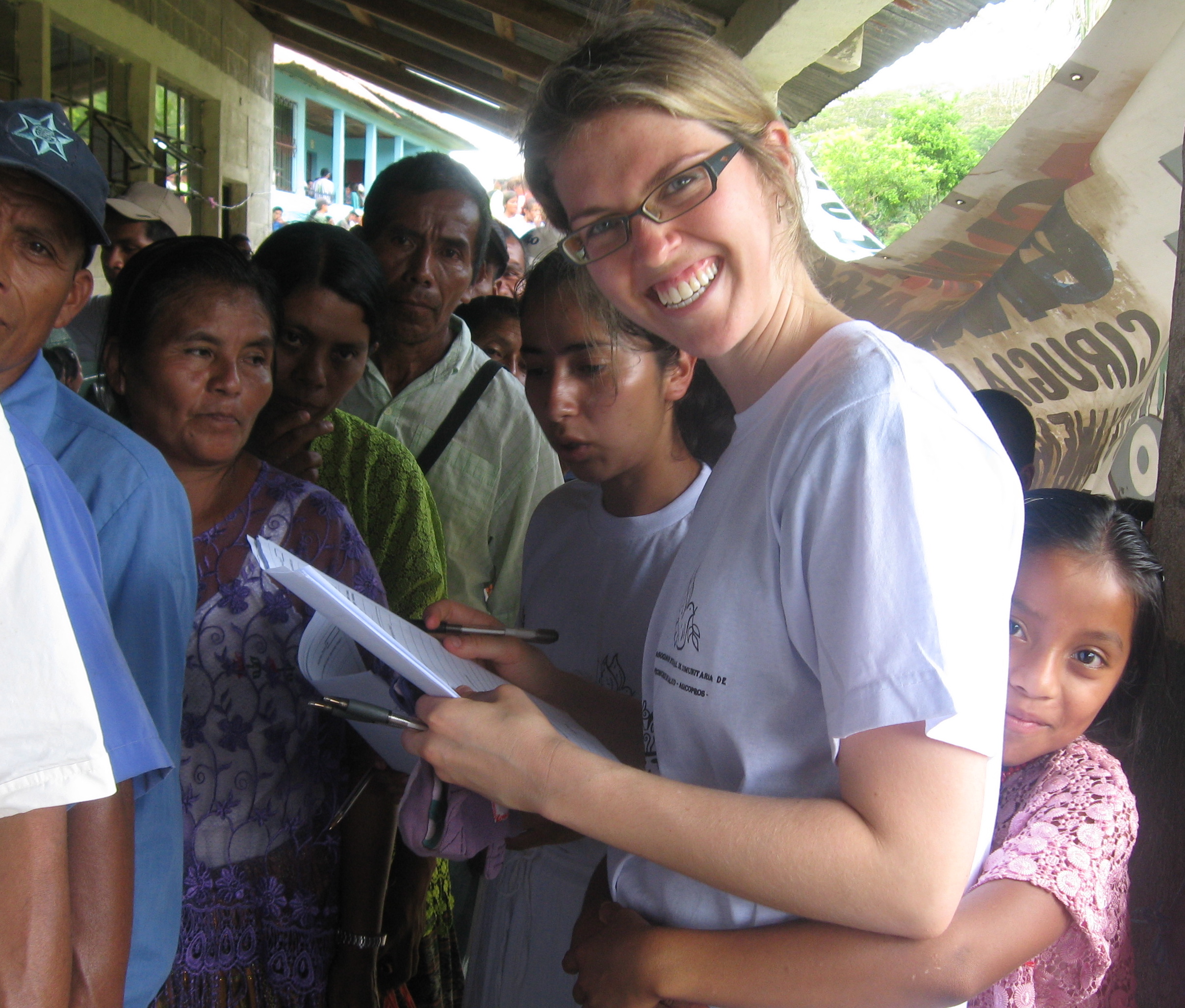 Interviewing Guatemalan women at the eye camp with support from a young friend!