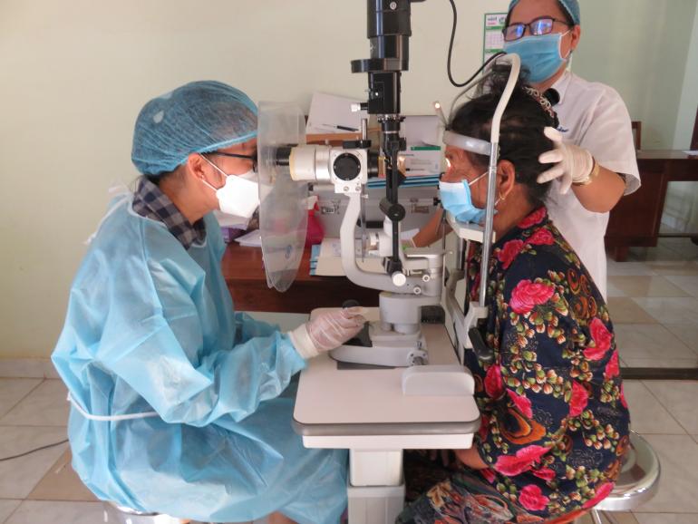 Cambodian Dr. Sorina eye examination 