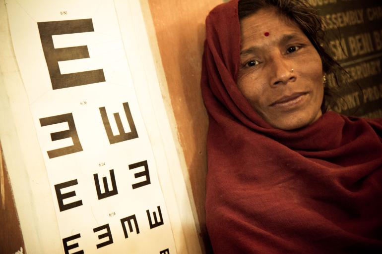woman getting screened at eye camp