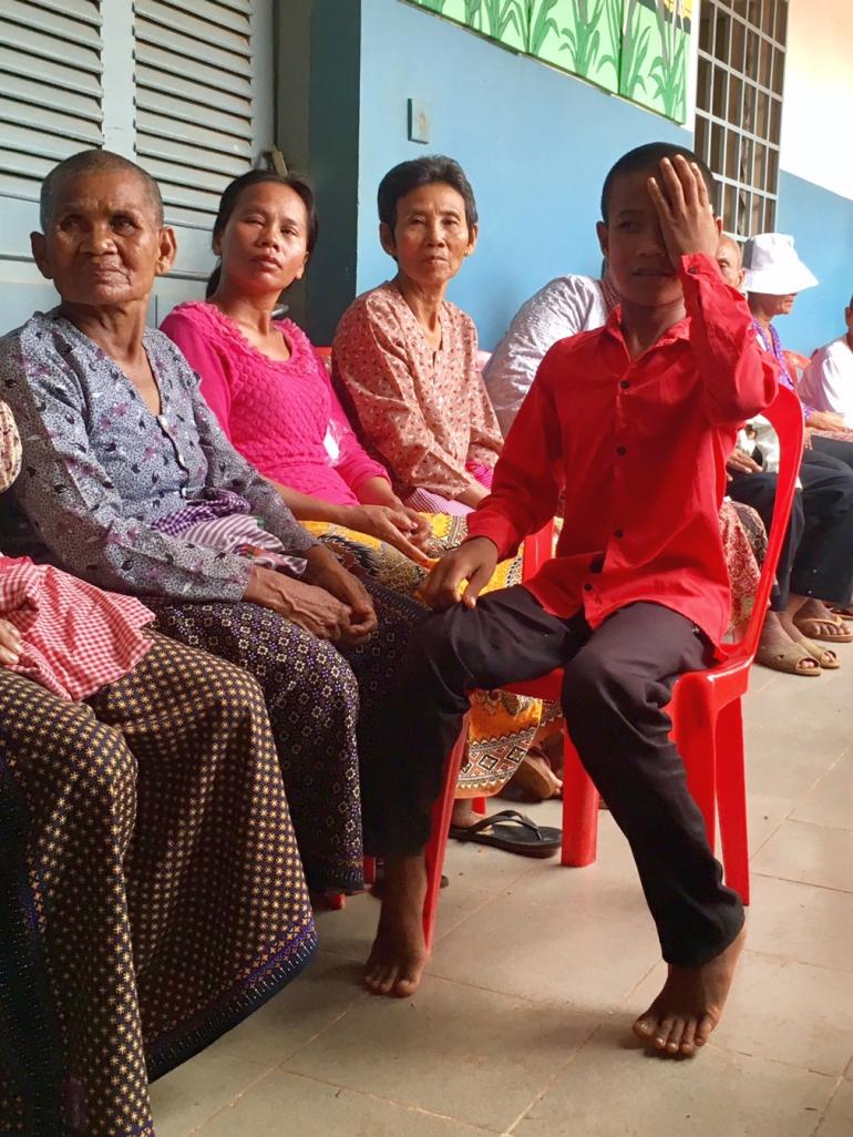 Torng Cambodian boy vision test post surgery