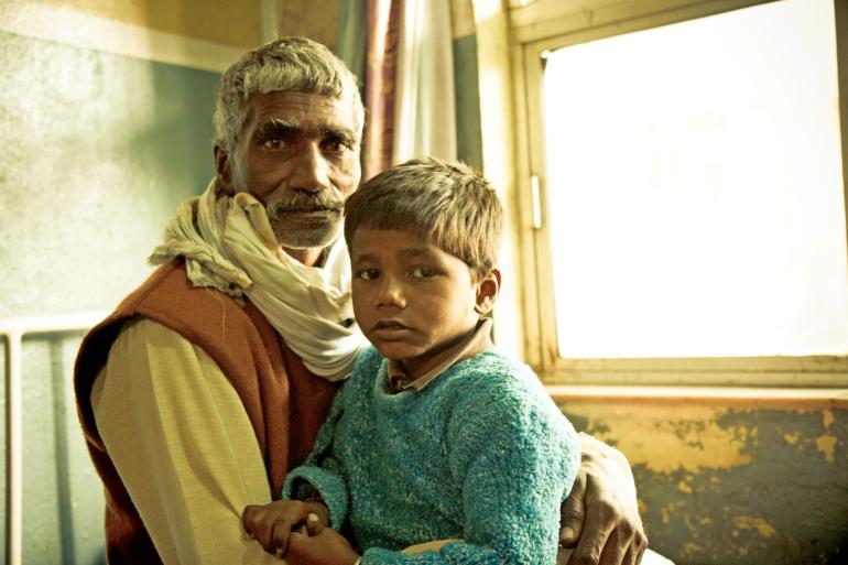 Nepalese Grandfather and Grandson by Ellen Crystal
