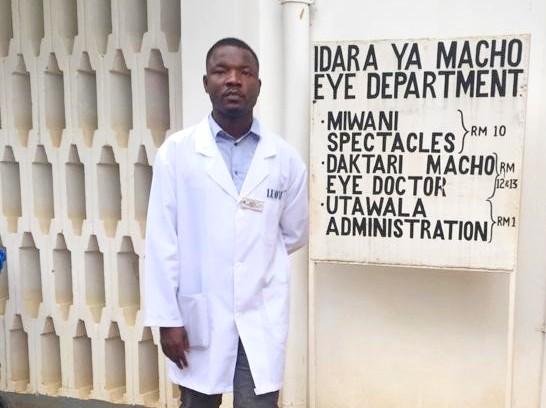 Dr. Mbaga at the Mara Eye Hospital Entrance