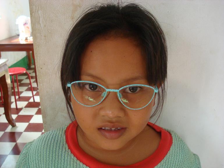 Cambodian girl Rorsynin in her new glasses
