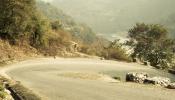 winding road in nepal banner