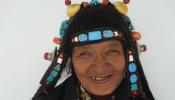 Tibetan Woman Wearing Traditional Jewelry and Clothing Banner