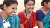 Evidence Informed Program Banner Image of 3 Indian Women in the Field