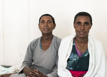 Maguaye and her daughter in Ethiopia sitting on a hospital bed photo by Stephanie C. Glotman