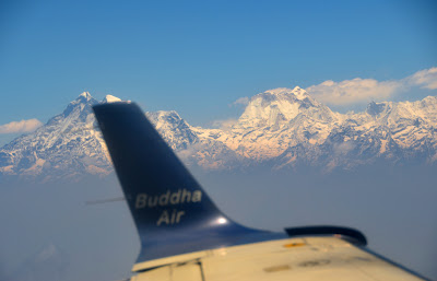 view of Himalayas out plane window
