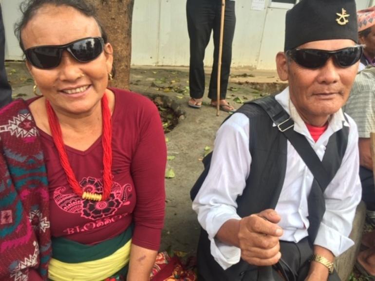 Kali Maya and Suka sitting together after cataract surgery in Nepal